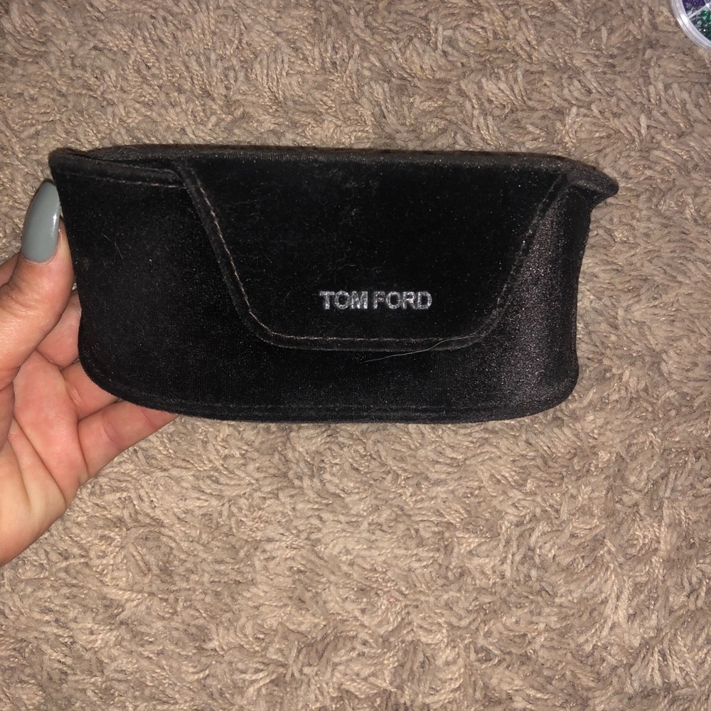 Velvet Tom Ford sun glass case.